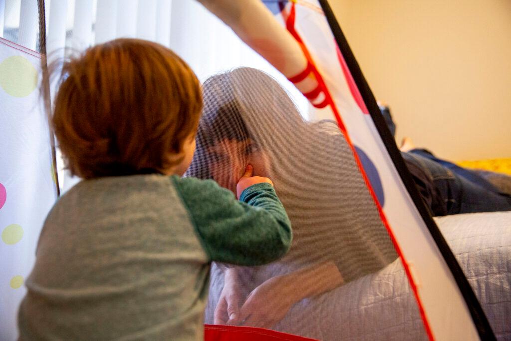 Sylvia and Bodhi Johnston play in a ball pit in Bodhi&#039;s room. March 26, 2022.