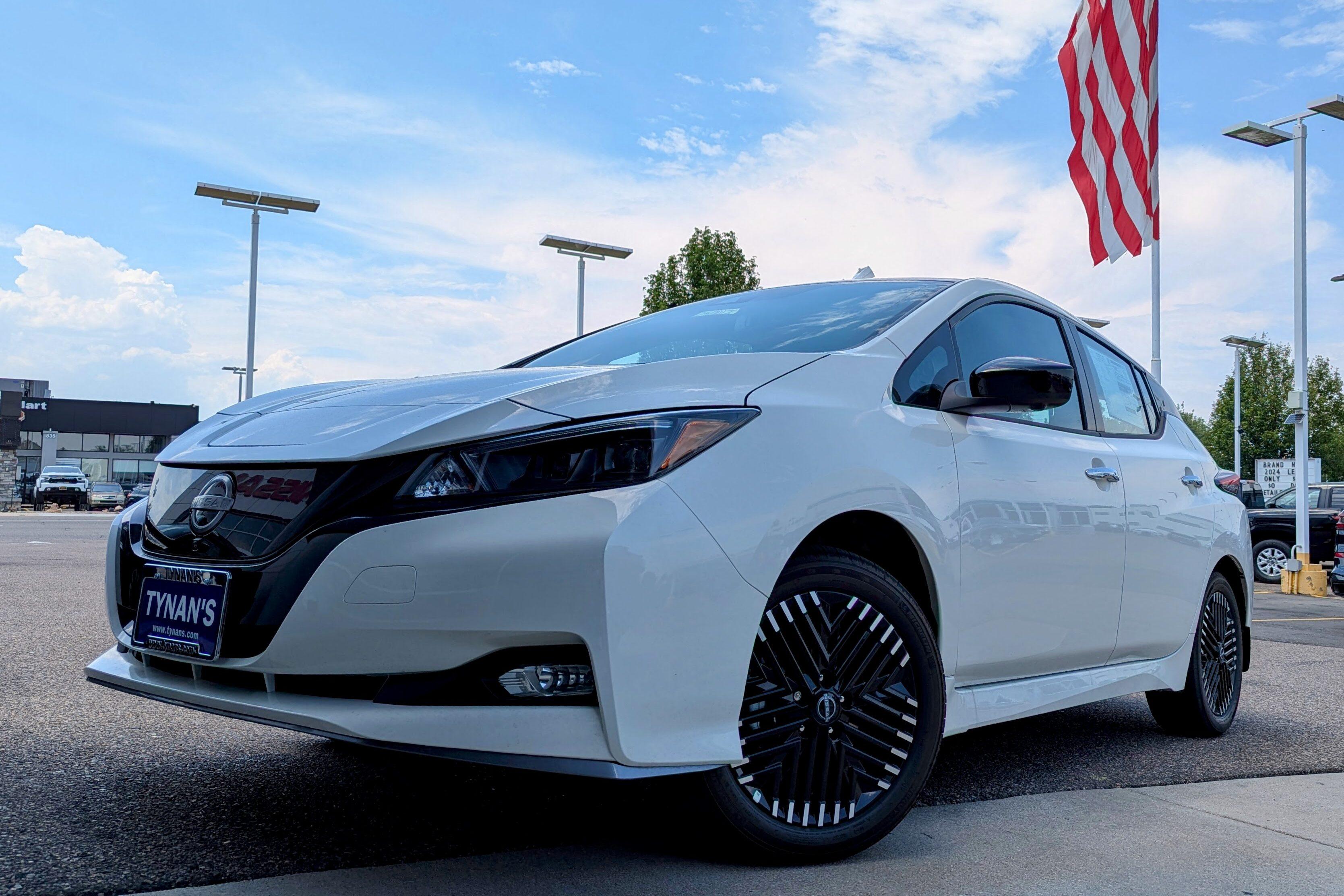 White Nissan Leaf EV at Tynan's Nissan dealership.