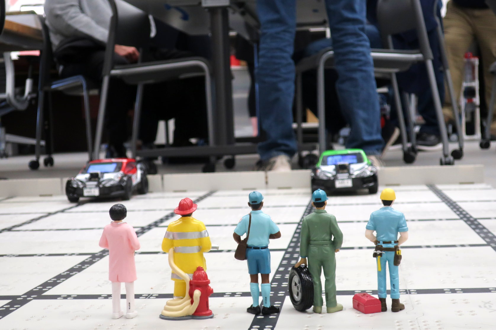 Toy models demonstrate an image recognition program that uses AI.